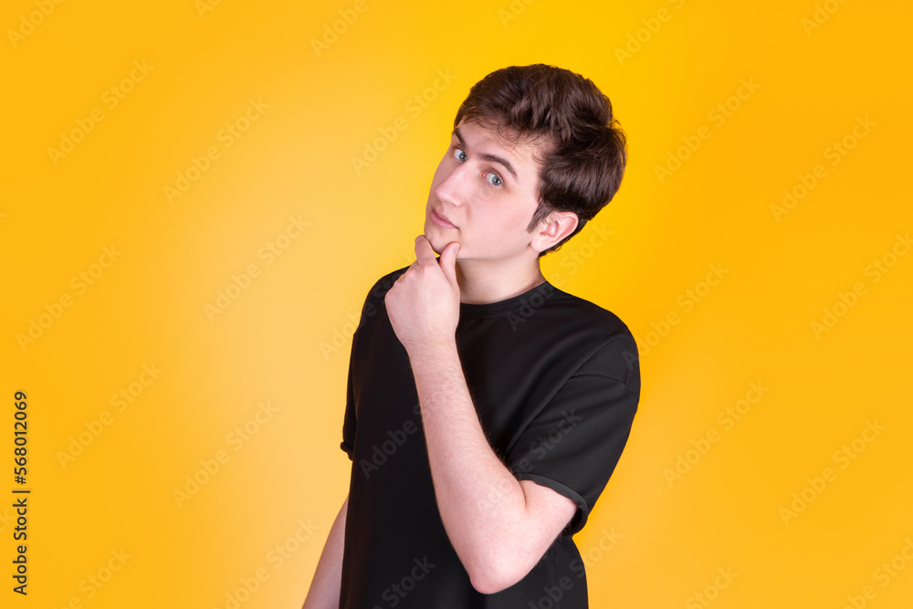 A Handsome guy on yellow background A Handsome guy on yellow background