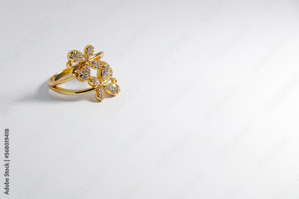golden rings on white plain background golden rings on white plain background