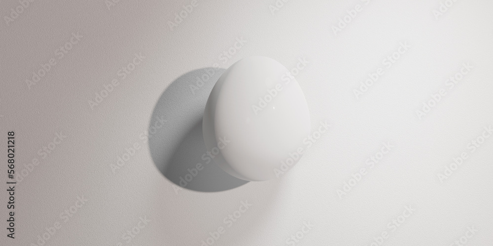 White egg on white background. Copy space. Single wholesome food item. White egg on white background. Copy space. Single wholesome food item.