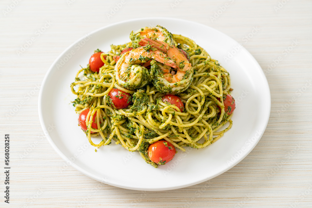 Spaghetti with prawns or shrimps in homemade pesto sauce