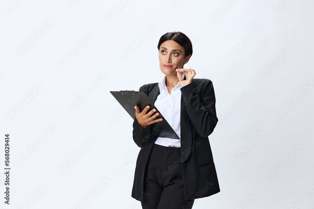 Business woman folder with documents in black business suit shows signals gestures and emotions on white background, freelancer job online time management Business woman folder with documents in black business suit shows signals gestures and emotions on white background, freelancer job online time management