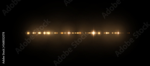 Abstract stylish golden light effect on black background. Gold glowing shimmering lines. Golden glowing dust and glare. Flash Light. Light trail. Vector illustration. 