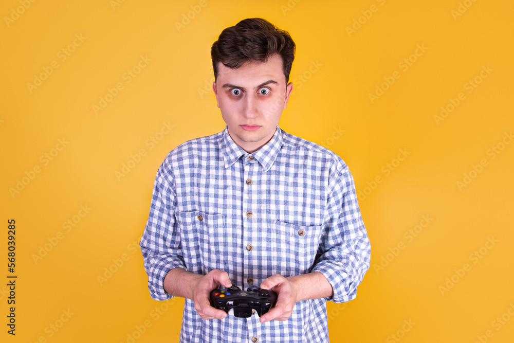 A handsome guy on a yellow background A handsome guy on a yellow background