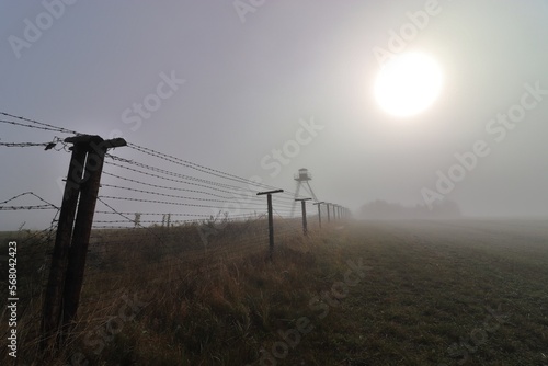 Remainder of the Iron Curtain in the border of Czech republic and Austria in morning fog