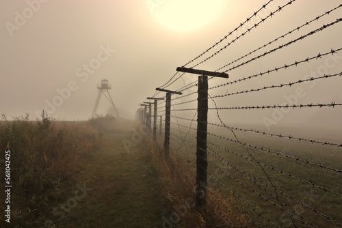 Remainder of the Iron Curtain in the border of Czech republic and Austria in morning fog