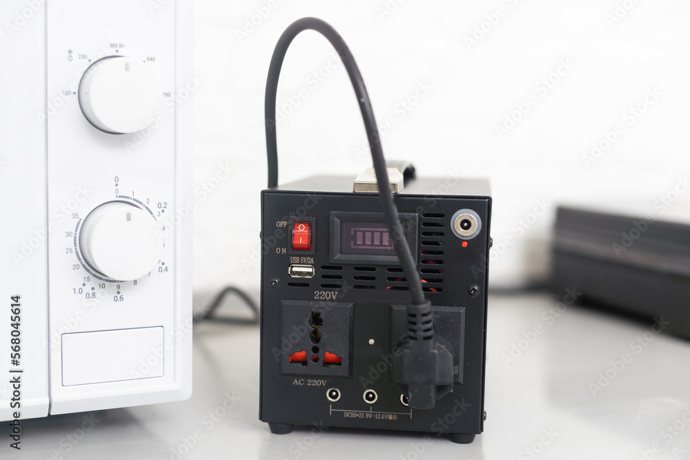 Obraz premium portable power station Effortlessly stay charged with a stylish charging station photo. Ideal for tech enthusiasts, busy professionals, and anyone who values convenience