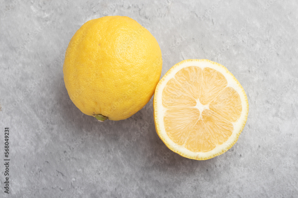 yellow lemons on a gray background yellow lemons on a gray background