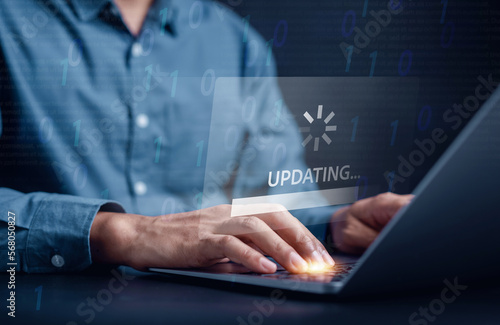 Update software system in computer. Man using smartphone upgrade program, Business technology internet loading virtual bar with installing the update for the quality better.