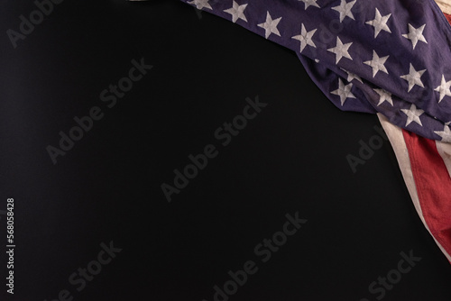 Happy presidents day concept with flag of the United States on black background.