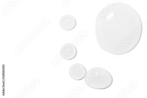 large drops of transparent gel or serum or water, on a white background, top view, isolated