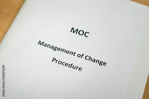 Cover of the MOC, Management of Change procedure manual book. Industrial or business safety working concept, close-up and selective focus. 