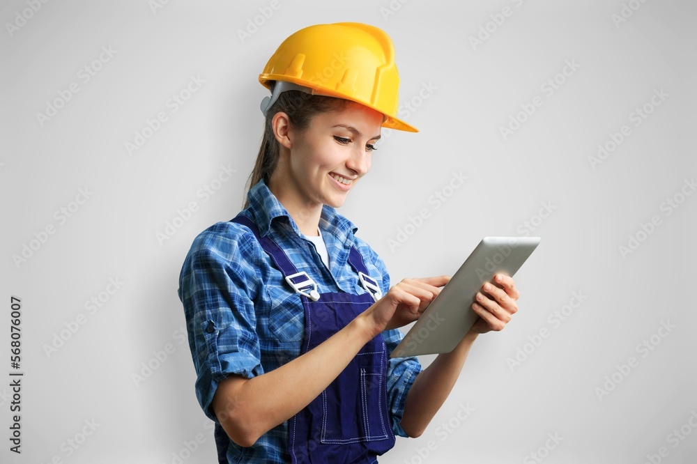 Young architect employee hold digital tablet Young architect employee hold digital tablet