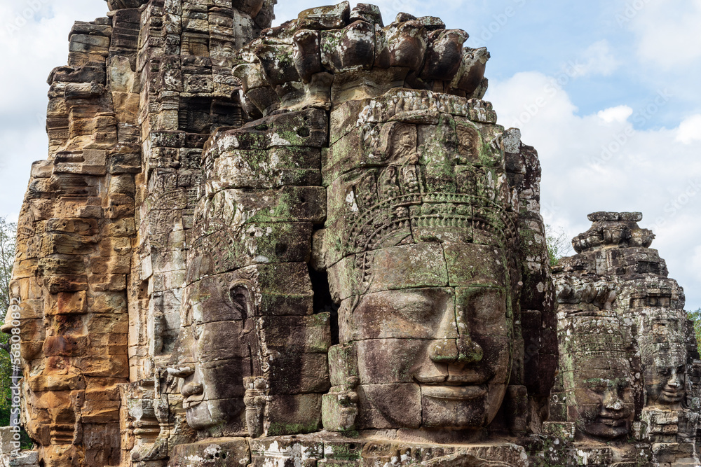 A few of the many smiling faces which can be found in the Bayon Temple, part of the Angkor Wat complex outside of Siem Reap, Cambodia.