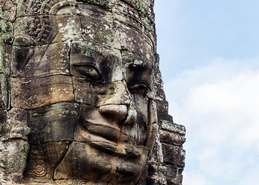 One of the many smiling faces which can be found in the Bayon Temple, part of the Angkor Wat complex outside of Siem Reap, Cambodia. One of the many smiling faces which can be found in the Bayon Temple, part of the Angkor Wat complex outside of Siem Reap, Cambodia.