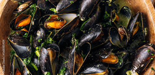 fragrant boiled mussels in herb and cream sauce