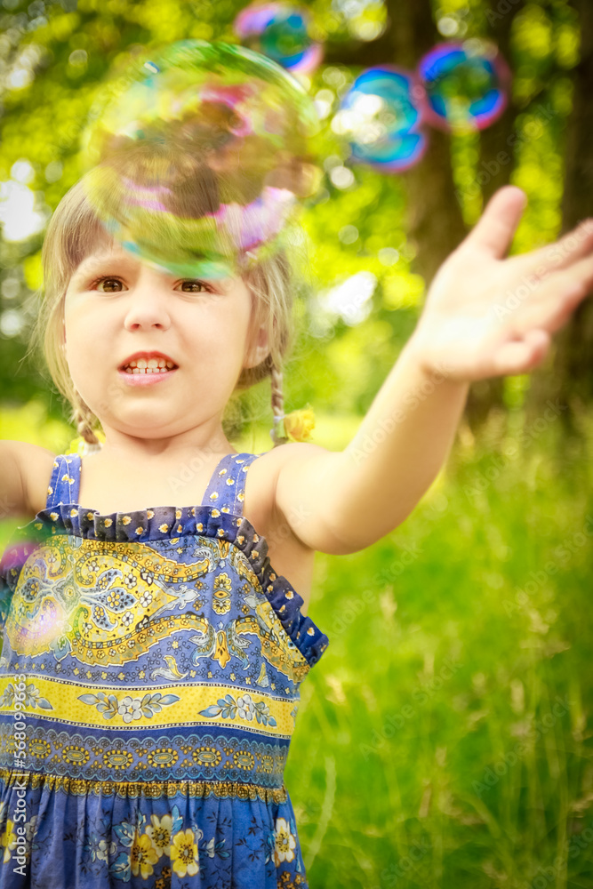 happy child having fun playing in the nature park happy child having fun playing in the nature park