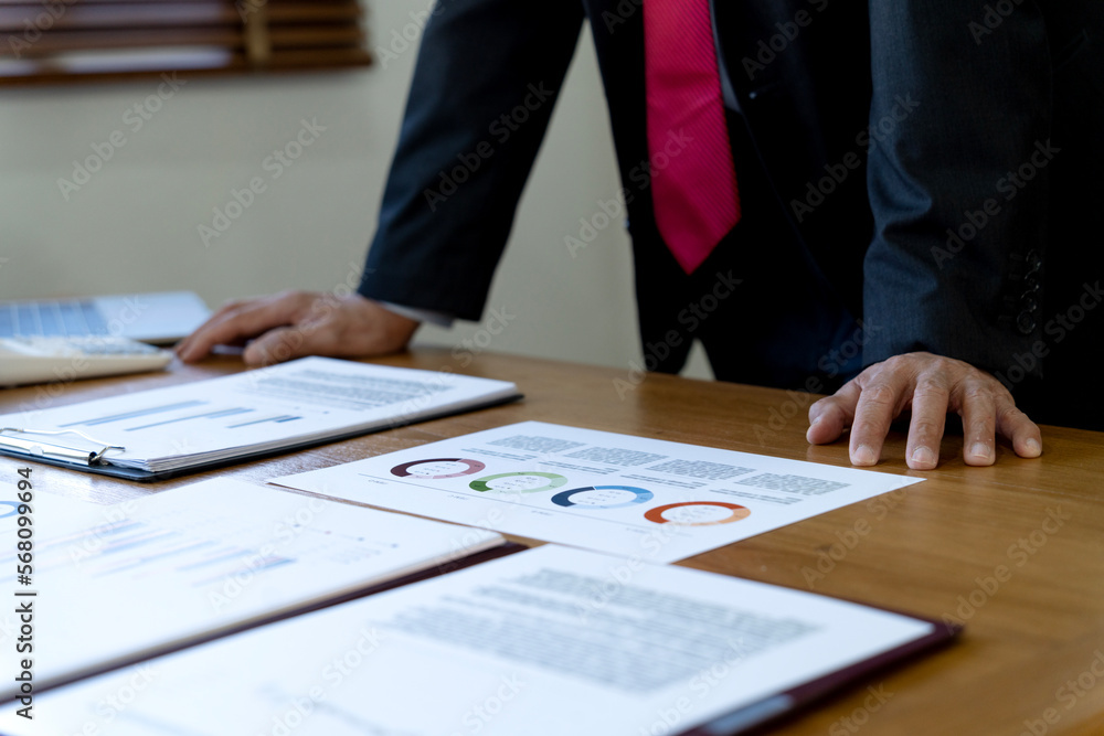 close up image of manager on desk, executive marketing analyst close up image of manager on desk, executive marketing analyst
