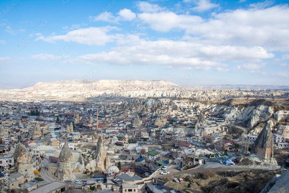 Göreme town as seen from the peak of a mountain.
