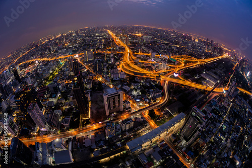 Skyline view of Bangkok business district at sunset. Bangkok Expressway and Highway top view, Thailand © funfunphoto
