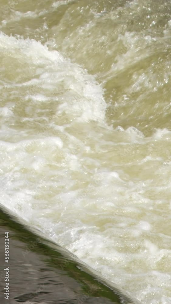 Streams of foaming water, full frame. Vertical video. Streams of foaming water, full frame. Vertical video.