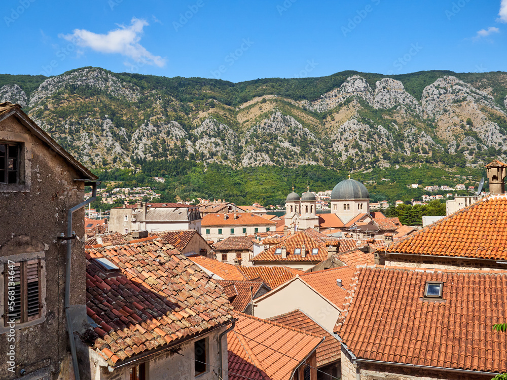Rooftop view of Kotor and the church of St. Nicholas in a sunny summer day. Kotor, Montenegro, Europe