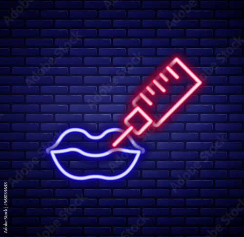 Glowing neon line Lip augmentation icon isolated on brick wall background. Hyaluronic acid lips injection. Contour plastic. Colorful outline concept. Vector