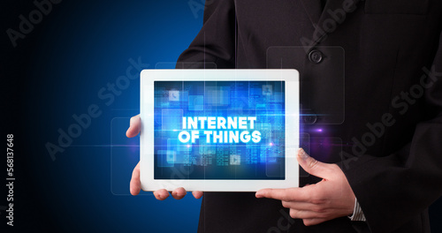 Wallpaper Mural Person holding tablet, technology concept Torontodigital.ca