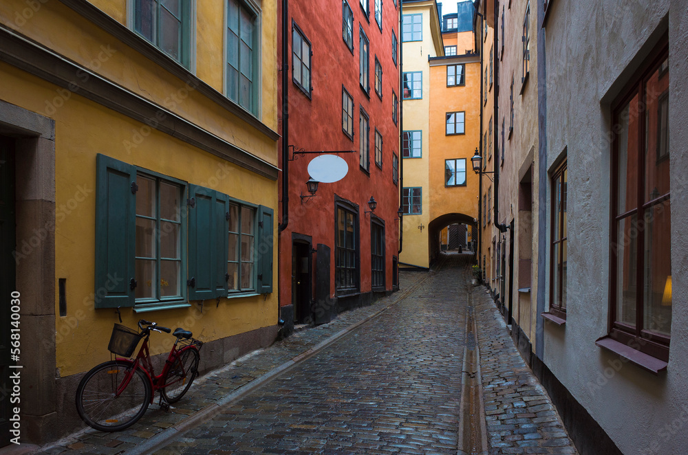 Stockholm old town Gamla Stan, Bicycle stands on a narrow street with colorful buildings, Sweden