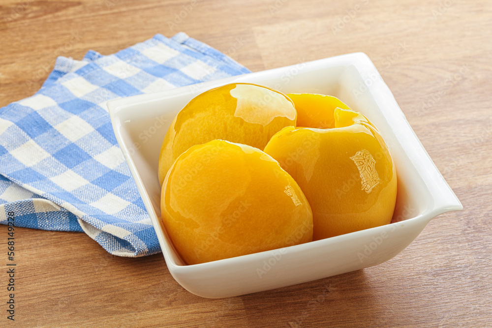 Sweet canned peaches with syrope Sweet canned peaches with syrope