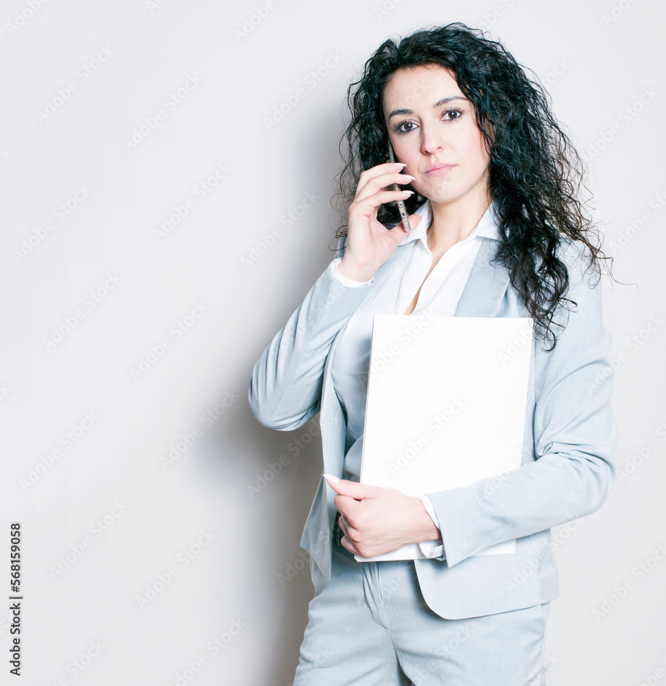 Young business woman making a phone call Young business woman making a phone call