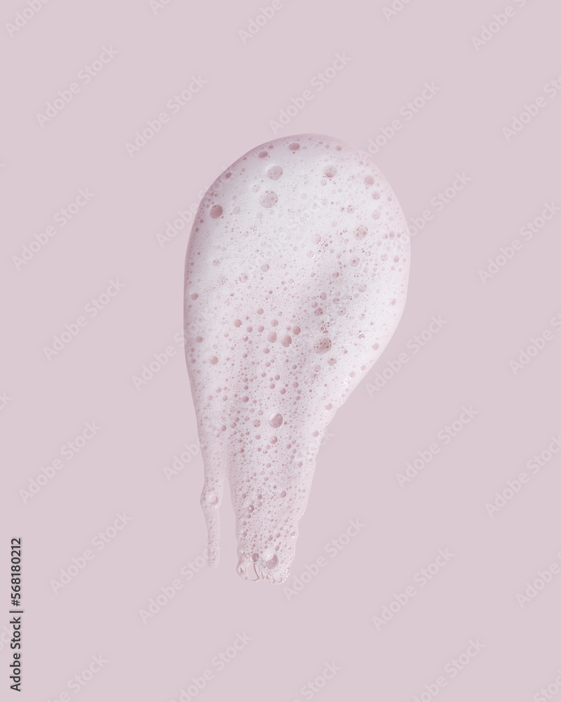 Face cleansing mousse texture on pink background Face cleansing mousse texture on pink background