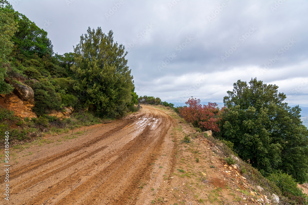 Country road with mud at Penteli mountain at Attica, Greece. Country road with mud at Penteli mountain at Attica, Greece.