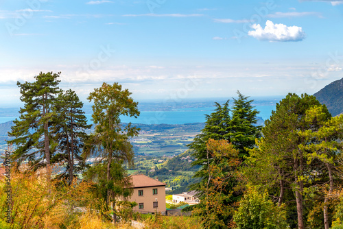 View of Lake Garda from the hilltop town of Spiazzi, Italy, the location of the Madonna Della Corona sanctuary in the Verona Province of Northern Italy.