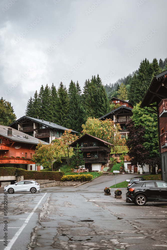 Wooden hut in the alps with mountains in the background Panorama