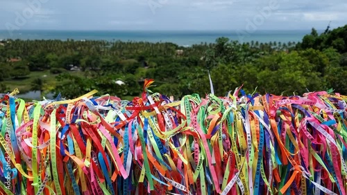 View from the colored ribbons of Nossa Senhora d'Ajuda at the Belvedere of Arraial d'Ajuda to the Praia dos Pescadores beach. Tourist destination of Bahia state, Brazil.