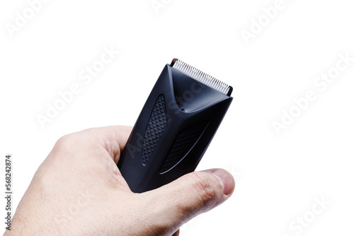 Body trimmer in hand transparent backdrop