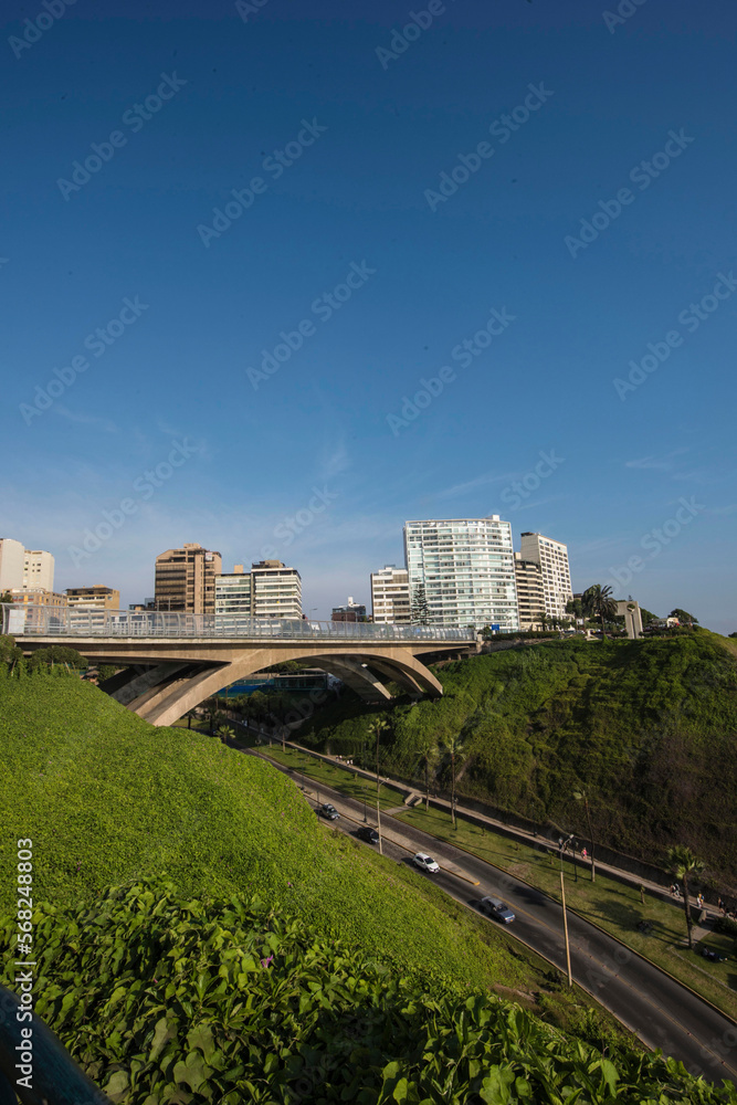 Obraz premium The Villena Rey Bridge in Miraflores district in Lima, June 2018- luxury building and ocean pacific Peru. Panoramic view