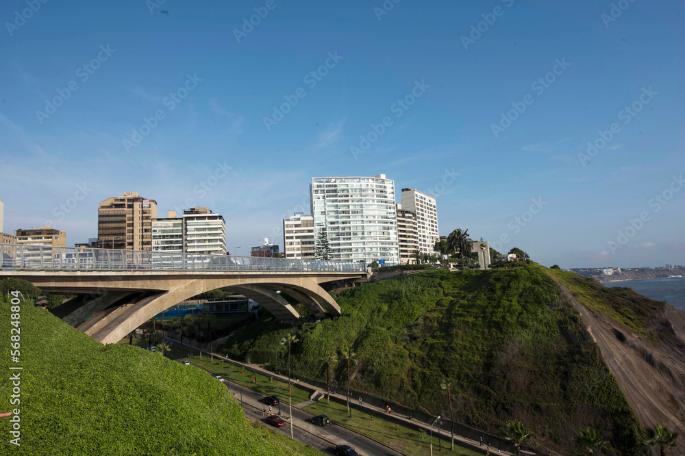 Obraz premium The Villena Rey Bridge in Miraflores district in Lima, June 2018- luxury building and ocean pacific Peru. Panoramic view