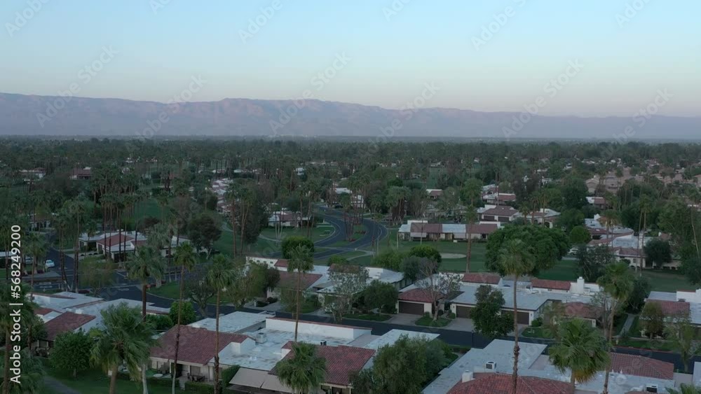 Aerial flying above quite and peaceful neighborhood surrounded by scenic landscape views in Palm Springs, California. Aerial flying above quite and peaceful neighborhood surrounded by scenic landscape views in Palm Springs, California.