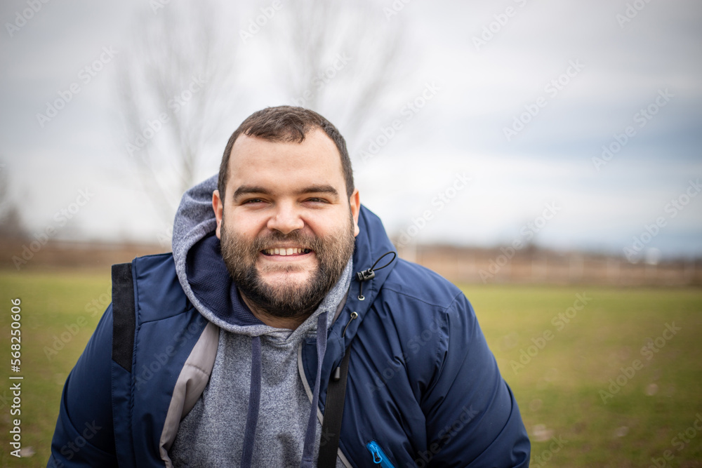 portrait of a person with a smile on a face