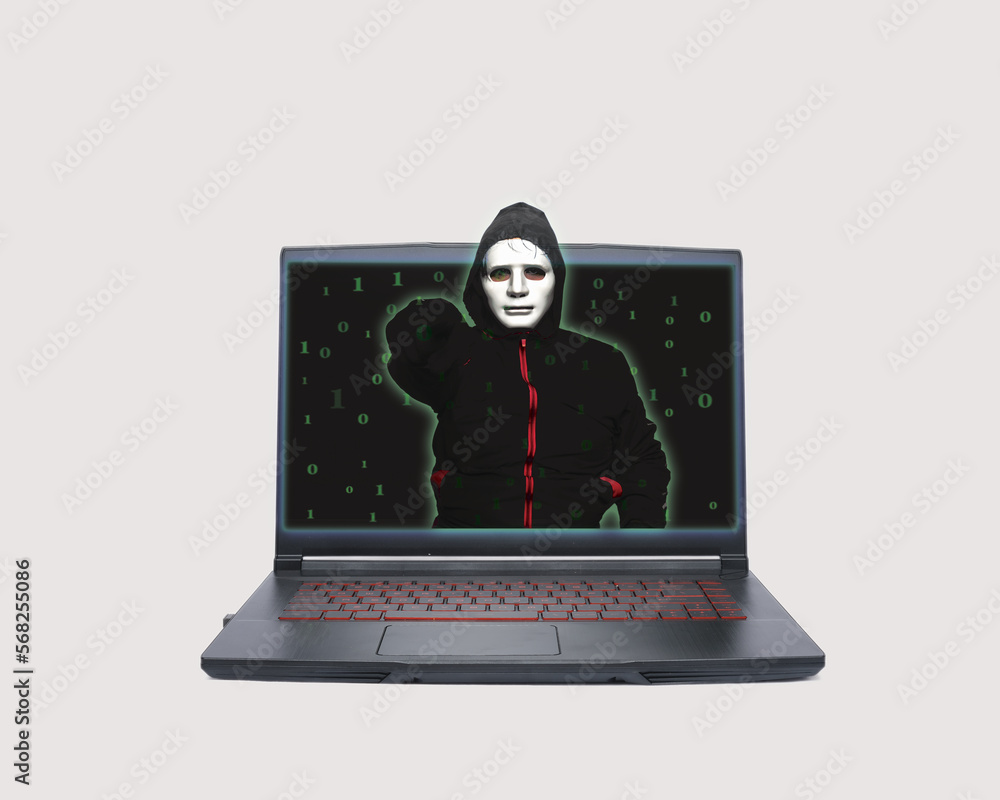 A picture of hacker appear from laptop with binary code. Cybersecurity threat and dark web concept.