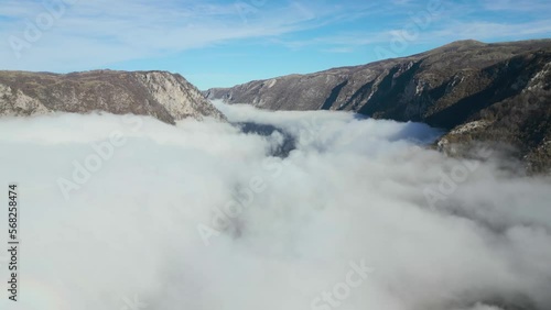 Wallpaper Mural aerial view, clouds in mountain canyon. Valley of piva lake in Montenegro Torontodigital.ca