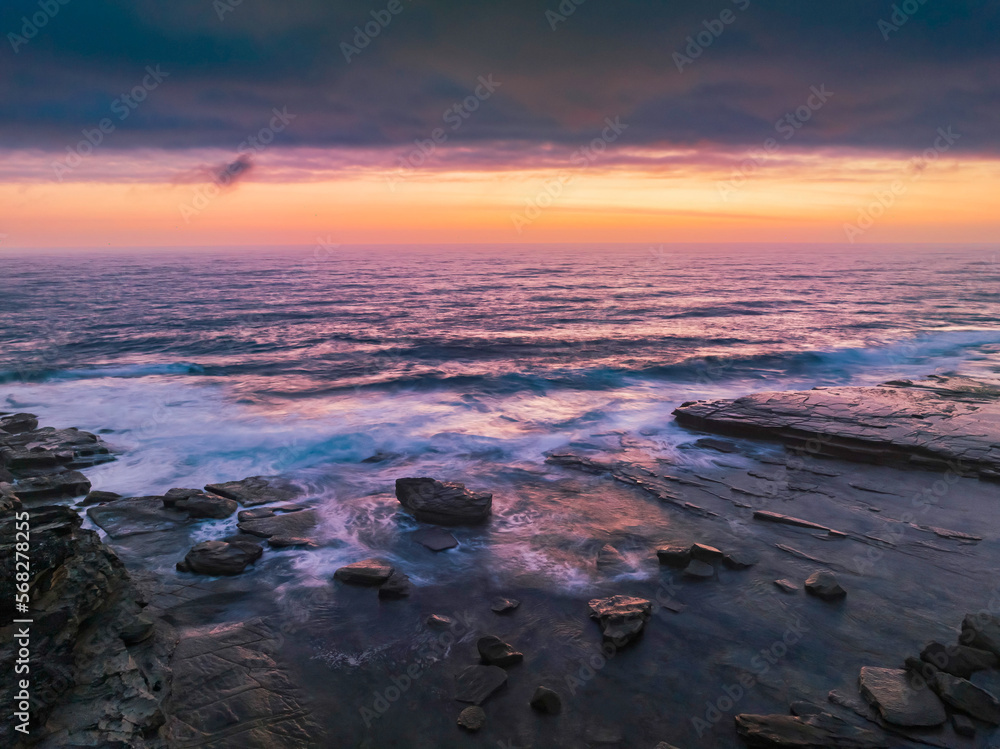 Hazy Summer Sunrise Seascape and Rocky Inlet