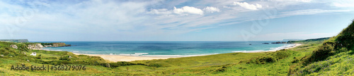 White Park Bay beach and sand dunes on the Giants Causeway Coast of County Antrim, Northern Ireland. Panorama. Summer