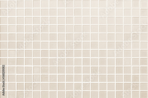 Cream light ceramic wall chequered and floor tiles mosaic background in bathroom. 