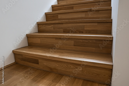 Wooden stairs in modern building, closeup