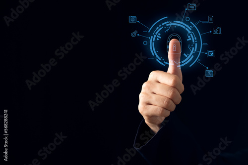 Cybersecurity and privacy concepts to protect data. Lock icon and internet network security technology. Businessman protecting personal data on smart phone with virtual screen interfaces