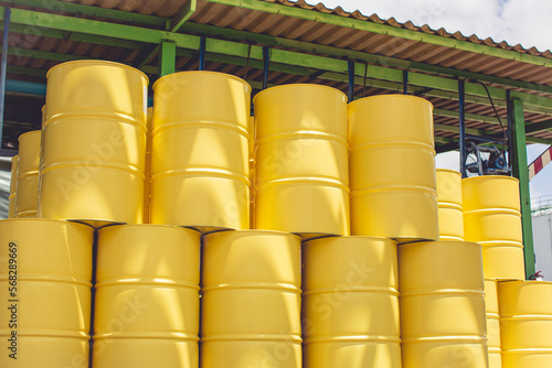 Oil barrels yellow or chemical drums vertical industrial