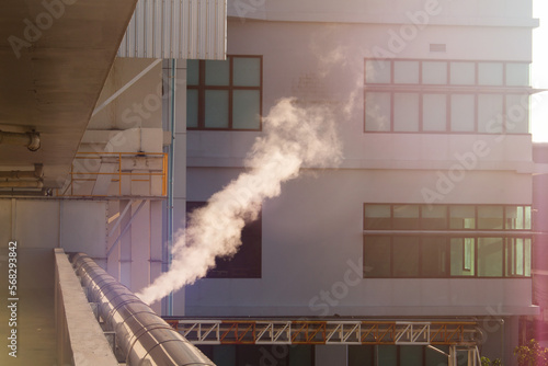 Smoke from the power pipeline with sunlight