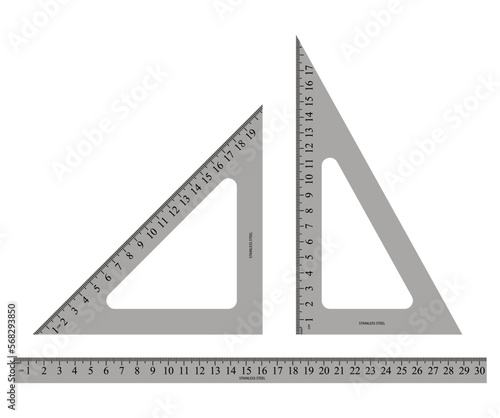 iron ruler and two stainless steel triangles on white background